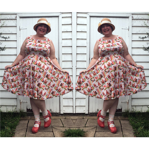 Whole Lotta Hilda Dress midi-length skater-style circle dress featuring plus size pin-up pics