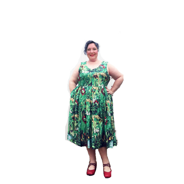 Audrey II Vee Sleeveless plus size dress with pockets in a carnivorous plants print available up to size 36
